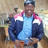 G. Charles KOMADJA