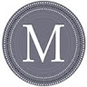 M C