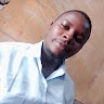 Wycliff M K