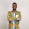 SIMON DOGBE