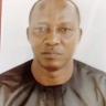 MARTIN C. OGAYI