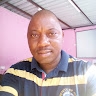 JOHN MUMBA