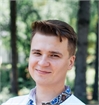 Роман Косьміна