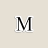 M B