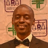 Dr. Kowiti John