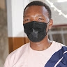JOHN GATHUITA