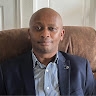 John K Mwaura