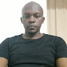 DR. CHARLES MUANGO