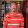 Tom Hillary Komolo