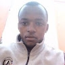 TUSIIME JOHNOSCAR